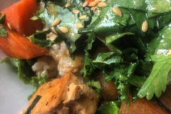 Brown rice bowl with tofu, carrots, cilantro, and ginger coriander dressing!